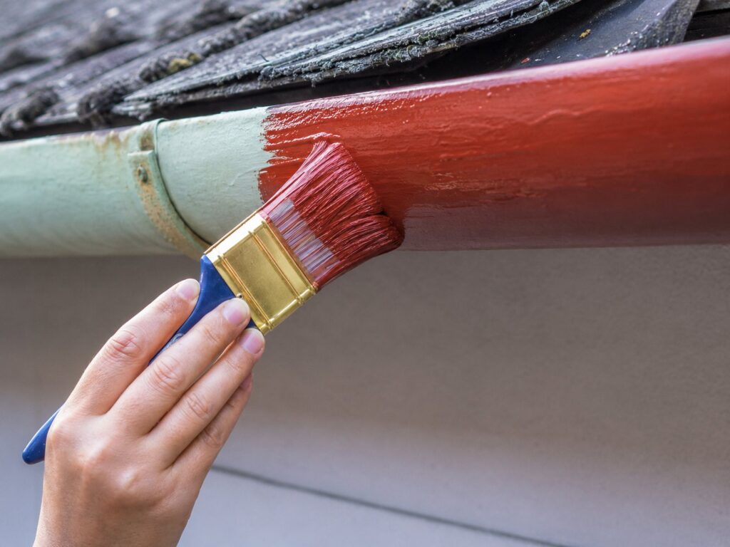 Can You Paint Gutters & Is It Worth It? Can gutters be painted? Gutters being painted vs. replacement.